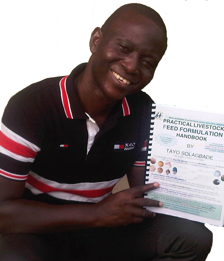 Holding a Ready-to-Dispatch Print Copy of My Popular Practical Feed Formulation Handbook